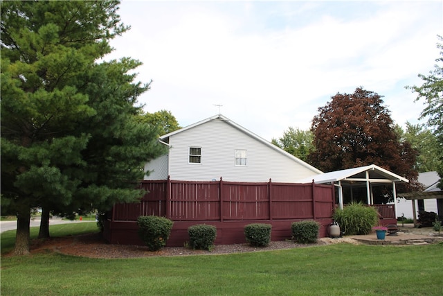 view of property exterior featuring a yard