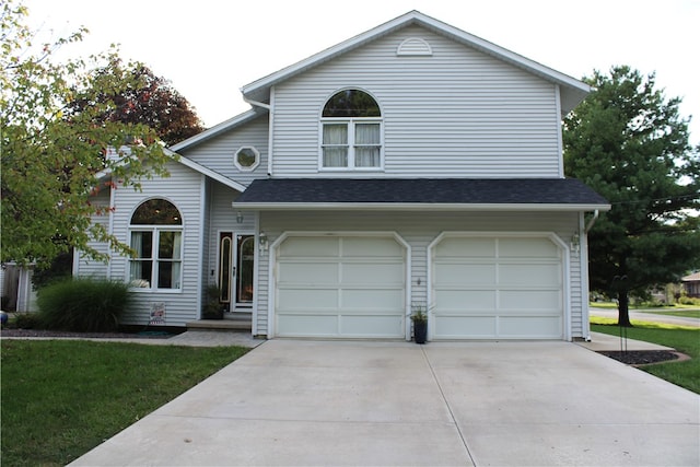 view of front of home with a garage