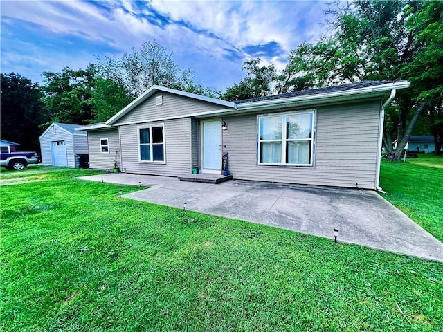 100 Chaparral St, Watson, IL 62473 - rear view of property featuring a patio area, a yard, and a garage