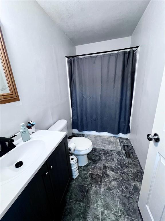 100 Chaparral St, Watson, IL 62473 - bathroom featuring vanity and curtained shower