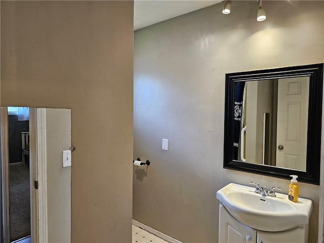 201 N Indiana St, Toledo, IL 62468 - bathroom with vanity and baseboards