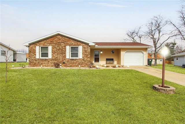 single story home featuring a garage, a front yard, brick siding, and driveway