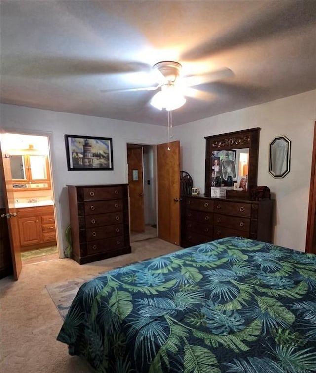 3254 Vista Dr, Danville, IL 61832 - bedroom with light carpet, connected bathroom, and a ceiling fan