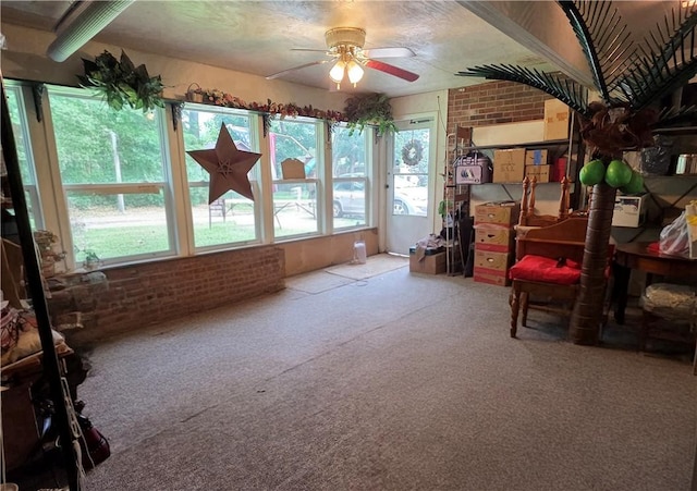 3254 Vista Dr, Danville, IL 61832 - sunroom featuring brick wall and carpet flooring