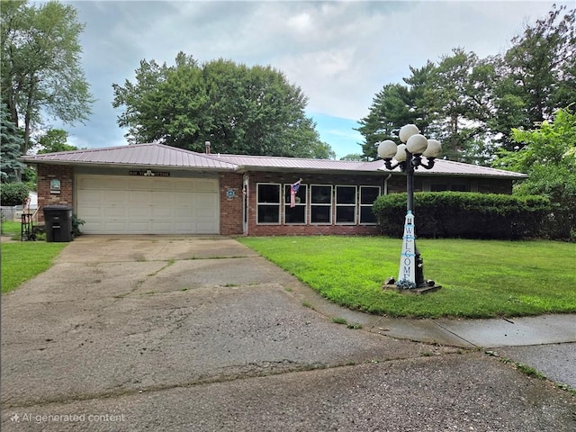 3254 Vista Dr, Danville, IL 61832 - ranch-style house featuring a front lawn, concrete driveway, an attached garage, brick siding, and a metal roof