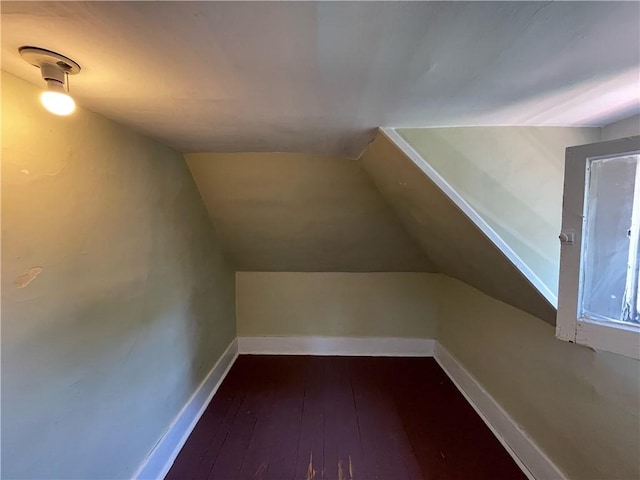 303 6th St, Charleston, IL 61920 - bonus room featuring lofted ceiling and hardwood / wood-style floors