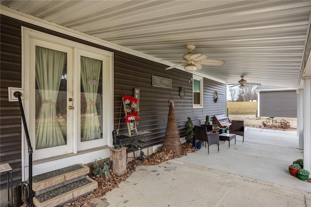 view of patio with french doors and ceiling fan