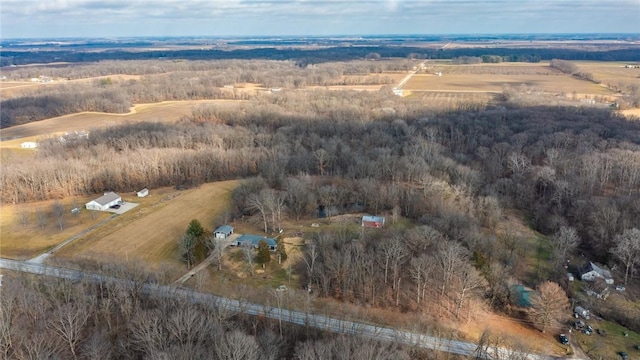 birds eye view of property with a rural view