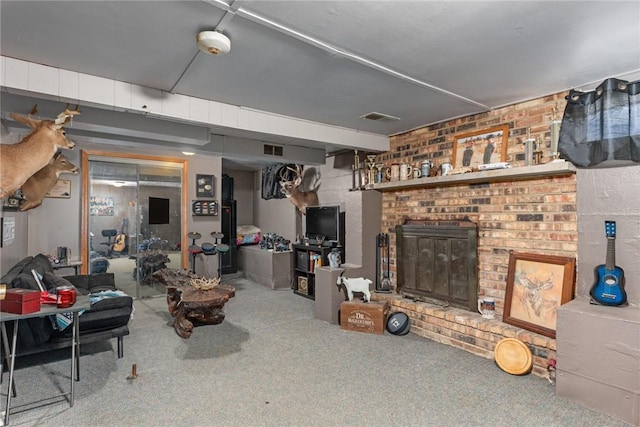 carpeted living room featuring a fireplace