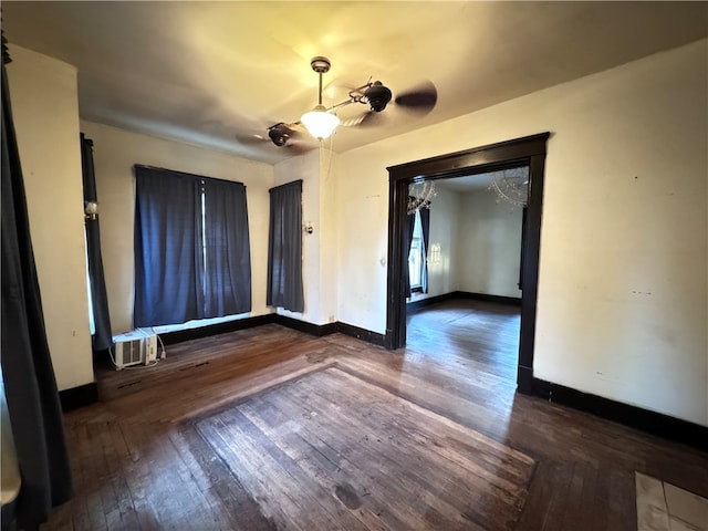 spare room featuring dark hardwood / wood-style floors