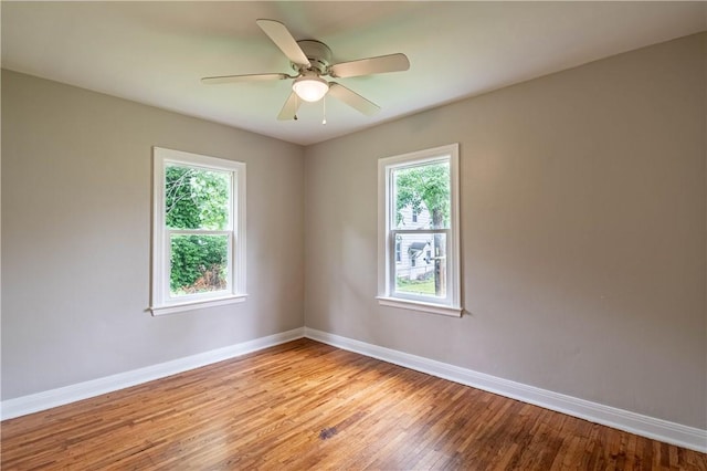 2036 E Dickinson Ave, Decatur, IL 62521 - spare room featuring light wood-type flooring and a ceiling fan