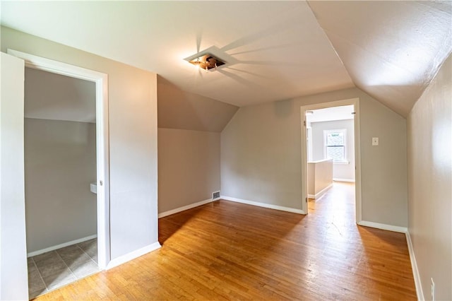 2036 E Dickinson Ave, Decatur, IL 62521 - additional living space with wood finished floors and lofted ceiling