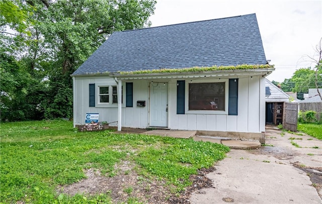 2036 E Dickinson Ave, Decatur, IL 62521 - bungalow featuring roof with shingles and board and batten siding