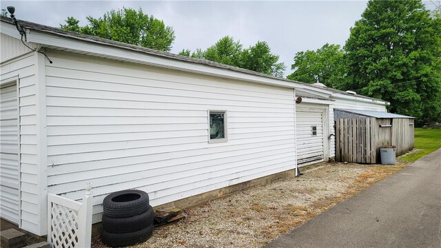 707 S Airport Rd, Decatur, IL 62521 - view of side of property with a storage unit