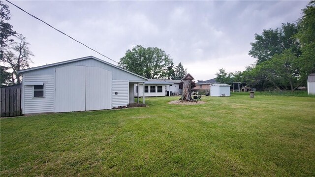 707 S Airport Rd, Decatur, IL 62521 - view of grassy yard with a shed