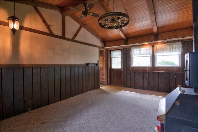 707 S Airport Rd, Decatur, IL 62521 - miscellaneous room featuring wood walls, healthy amount of natural light, wooden ceiling, a wainscoted wall, and carpet flooring