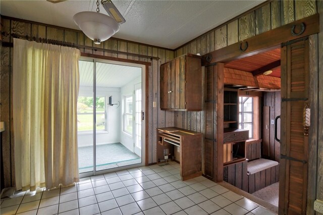 707 S Airport Rd, Decatur, IL 62521 - kitchen with light tile patterned floors