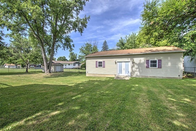 935 Woodland Dr, Mt Zion, IL 62549 - rear view of property with french doors and crawl space