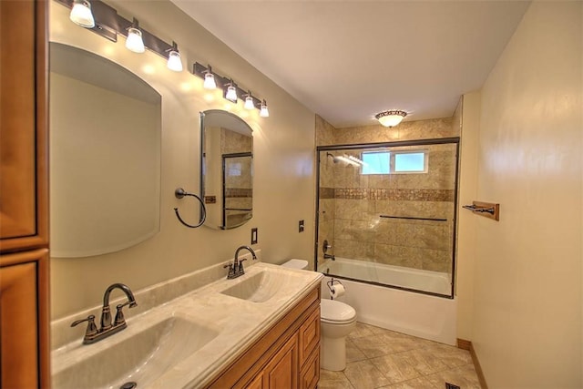 935 Woodland Dr, Mt Zion, IL 62549 - bathroom with double vanity, bath / shower combo with glass door, and tile patterned floors