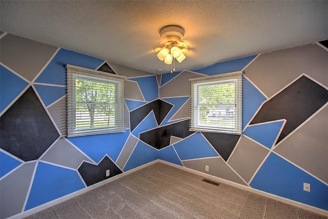 935 Woodland Dr, Mt Zion, IL 62549 - recreation room with a ceiling fan, a textured ceiling, and carpet