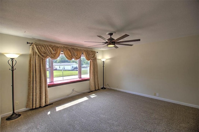 935 Woodland Dr, Mt Zion, IL 62549 - empty room with carpet floors, a textured ceiling, and ceiling fan