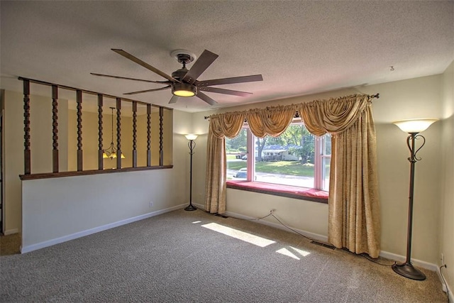 935 Woodland Dr, Mt Zion, IL 62549 - empty room with carpet, a ceiling fan, and a textured ceiling