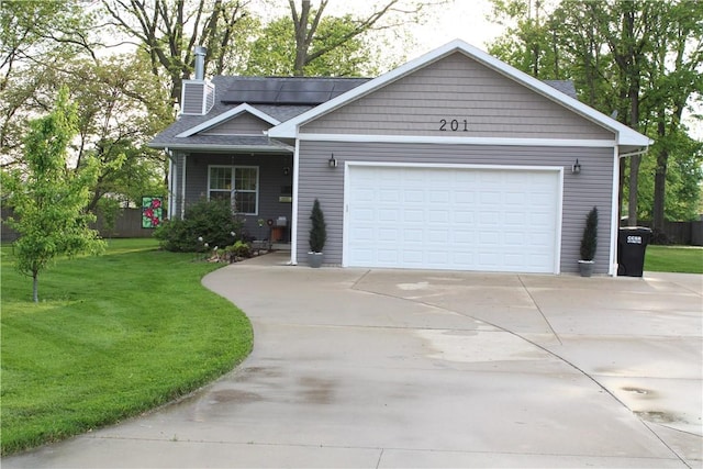 ranch-style house with concrete driveway, a chimney, a front lawn, and an attached garage