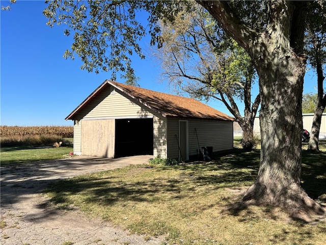 garage with a yard