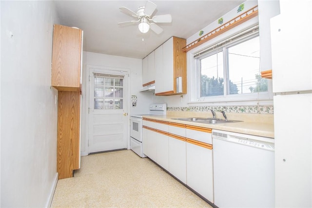 820 Oklahoma Ave, Mattoon, IL 61938 - kitchen with white appliances, light countertops, white cabinets, and a ceiling fan