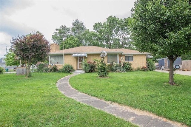 820 Oklahoma Ave, Mattoon, IL 61938 - single story home with a chimney and brick siding
