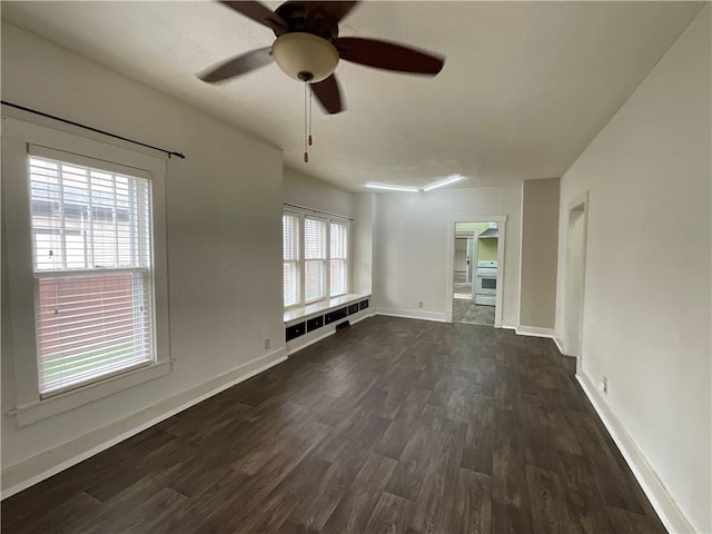 601 S Maple St, Effingham, IL 62401 - empty room with ceiling fan, dark wood-style flooring, and baseboards