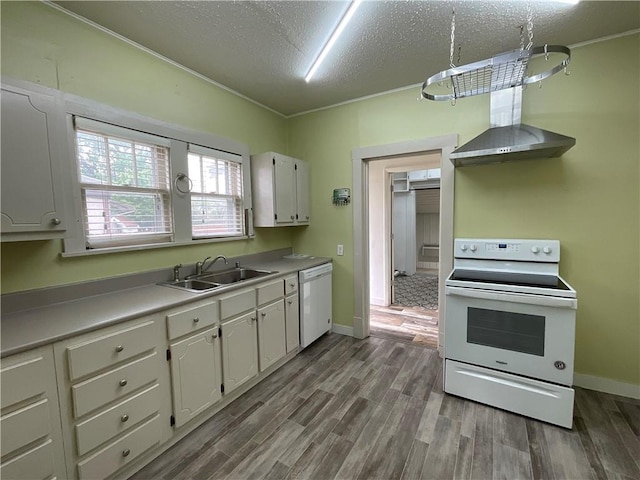 601 S Maple St, Effingham, IL 62401 - kitchen featuring white appliances, a sink, wood finished floors, white cabinets, and a textured ceiling