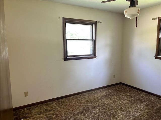 300 W Alabama Ave, Casey, IL 62420 - carpeted empty room featuring ceiling fan and baseboards
