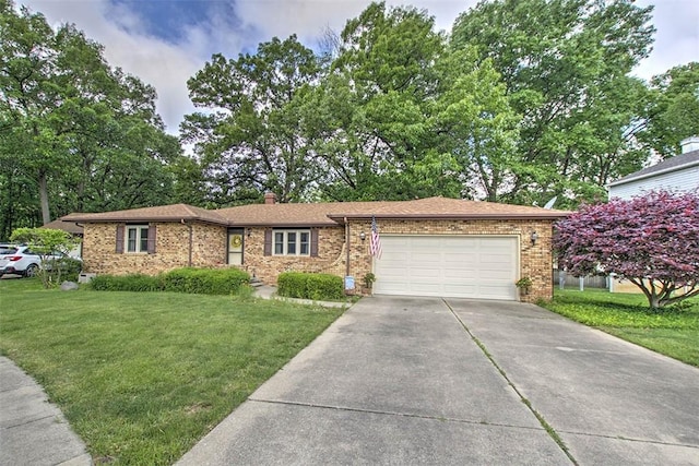 993 Cedar Hill Dr, Decatur, IL 62521 - ranch-style home featuring a garage, a front lawn, concrete driveway, brick siding, and a chimney