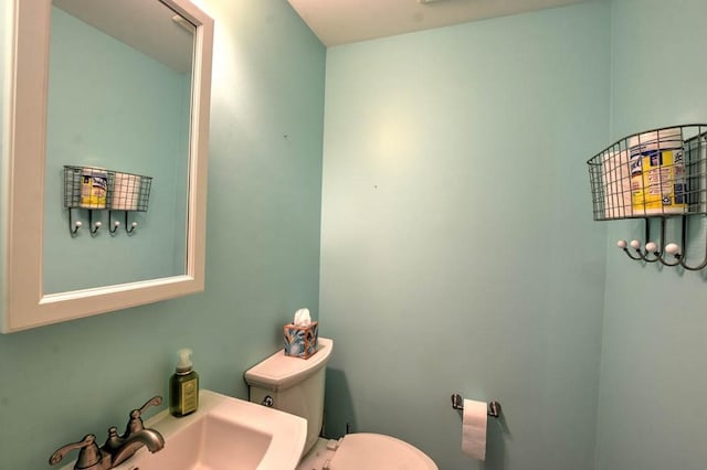 993 Cedar Hill Dr, Decatur, IL 62521 - half bathroom featuring toilet and a sink
