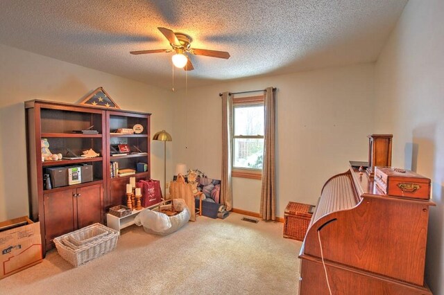 993 Cedar Hill Dr, Decatur, IL 62521 - carpeted bedroom featuring a textured ceiling and ceiling fan