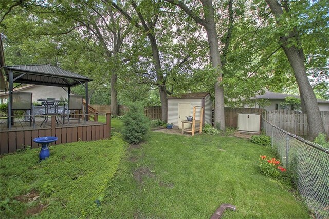 993 Cedar Hill Dr, Decatur, IL 62521 - view of yard featuring a gazebo and a wooden deck