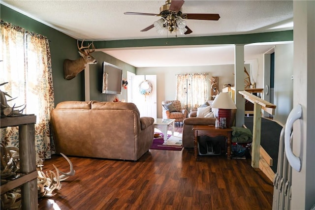 1741 Murray Clark Rd, Danville, IL 61832 - living room with a ceiling fan, beamed ceiling, wood finished floors, and a textured ceiling