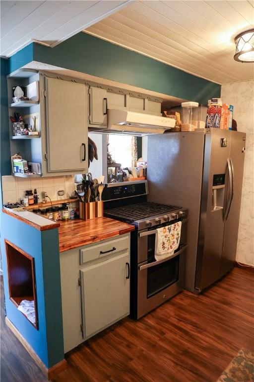 1741 Murray Clark Rd, Danville, IL 61832 - kitchen featuring dark wood finished floors, open shelves, stainless steel appliances, exhaust hood, and butcher block counters