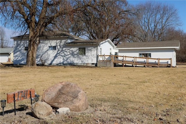 1741 Murray Clark Rd, Danville, IL 61832 - back of property with a wooden deck, a lawn, and crawl space