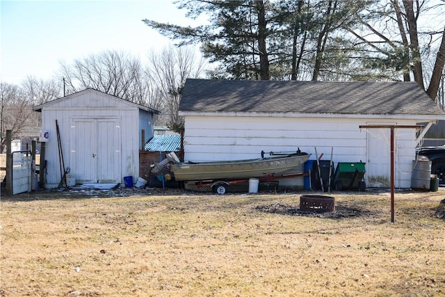 1741 Murray Clark Rd, Danville, IL 61832 - view of shed with an outdoor fire pit