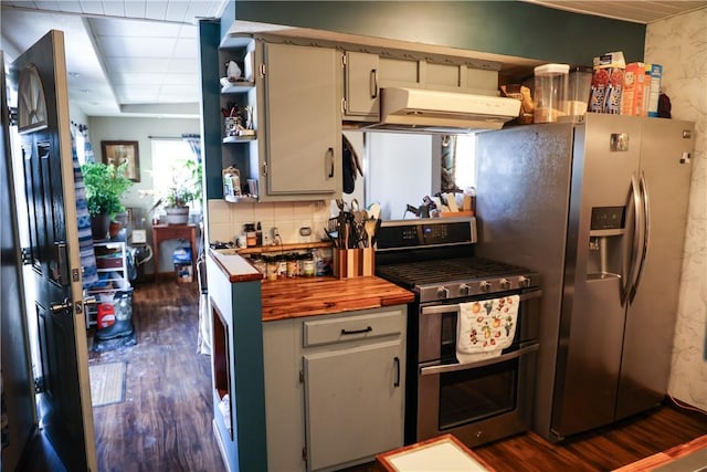 1741 Murray Clark Rd, Danville, IL 61832 - kitchen with under cabinet range hood, dark wood finished floors, butcher block counters, appliances with stainless steel finishes, and open shelves
