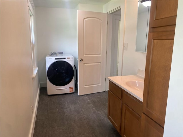101 S Sheridan St, Pana, IL 62557 - laundry area featuring washer / clothes dryer and baseboards