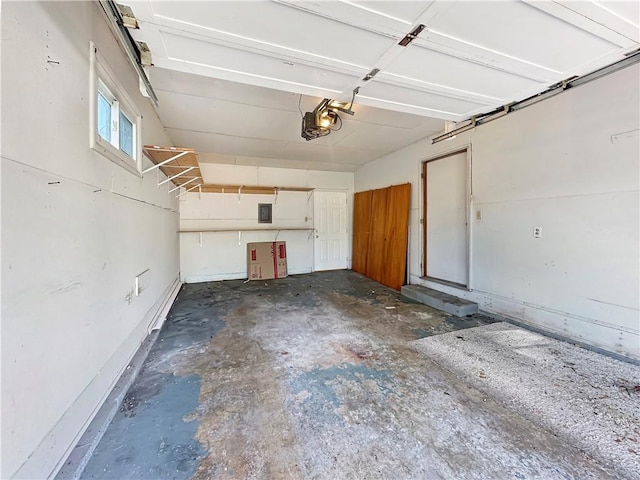 723 Kenton Dr, Charleston, IL 61920 - garage featuring a garage door opener