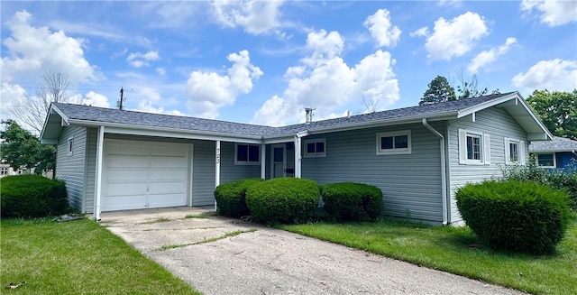 723 Kenton Dr, Charleston, IL 61920 - single story home with an attached garage and driveway