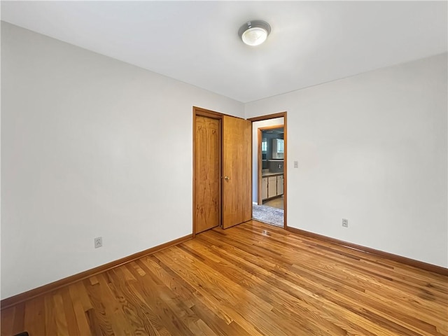 723 Kenton Dr, Charleston, IL 61920 - unfurnished room featuring light wood-style floors and baseboards