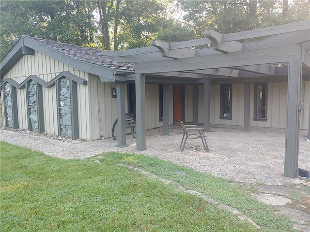 21491 N 1150th St, Marshall, IL 62441 - back of house featuring a patio and board and batten siding