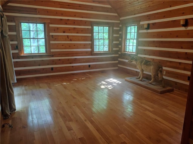 21491 N 1150th St, Marshall, IL 62441 - spare room with hardwood / wood-style flooring, vaulted ceiling, and wooden walls
