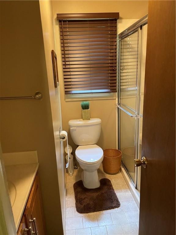 1101 Robinwood Dr, Robinson, IL 62454 - bathroom featuring vanity, a shower with shower door, and tile patterned flooring