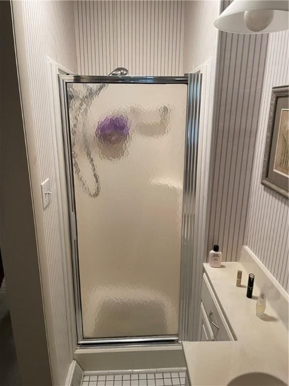 1101 Robinwood Dr, Robinson, IL 62454 - bathroom featuring wallpapered walls, a shower stall, and vanity